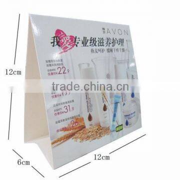 Calendar-shaped paper display for promoting cosmetics products