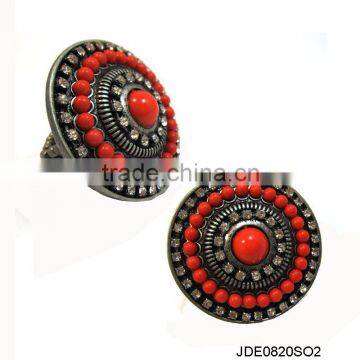 Plastic beads and stone in circle ring