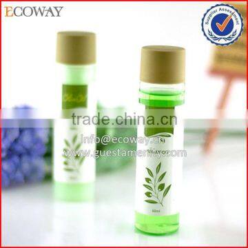 Tall thin hotel shampoo bottle with adhesive label