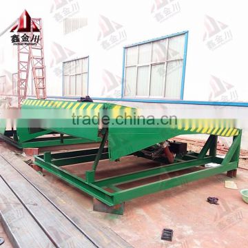 Large warehouse ramp, stationary adjustment height truck loading ramp