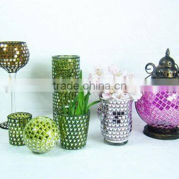 tall glass stemmed vase and mosaic decor ball