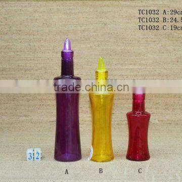 Glass oil bottle with color spray