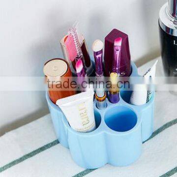 Cy269 Plastic Plum Blossom Shaped Dressing Table Cosmetic Storage Box Candy Color Desktop Separating Arrangement Box photo-3