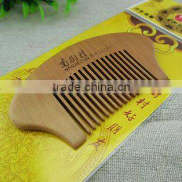 Carved various designs wooden hair comb