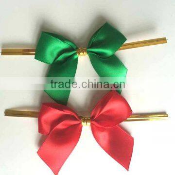 pre made ribbon bow with wire twist tie