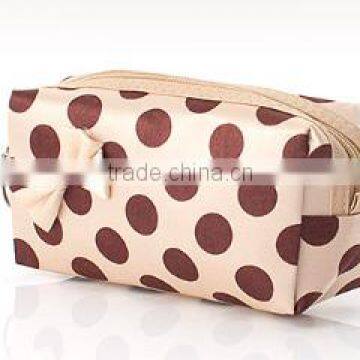 Hot sale satin dots printing cosmetic pouch with bowknot decorate china factory