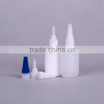 empty white color nail glue bottle