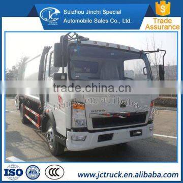 Diesel Power Type 8T sinotruck butt joint compression truck best supplier