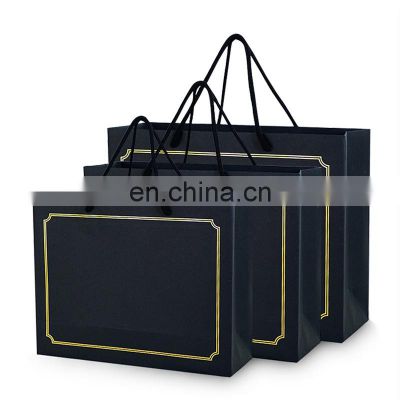 New Gold Logo Hot Foiled Stamping Black Matt Kraft Paper Bag With Cotton Rope Handles