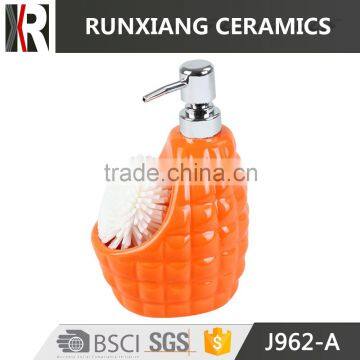 glazed orange ceramic soap dispenser