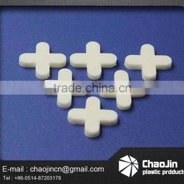 floor cross spacer