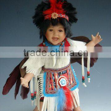 12" Indian boy doll in porcelain