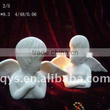 ceramic angel with candel light