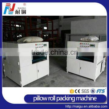 China Famous Factory NaiGu Manufacture Automatic Pillow Vacuum Roll Packing Machine photo-2