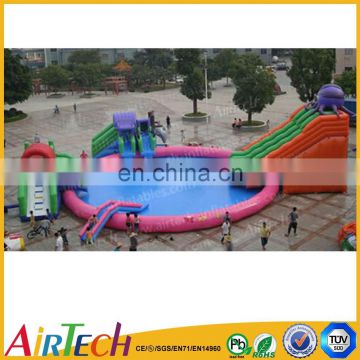 Inflatable water park with slide on land