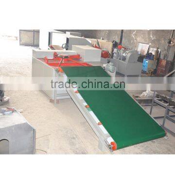 Automatically waste tire cutting strip and block machine