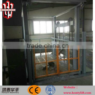 2016 hot sale vertical material guide rail lifting platform freight elevators for sale