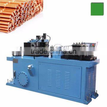 Copper capillary tube cut to length machine with end swaging and beading.