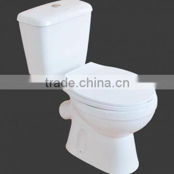 Two piece toilet, X-trap