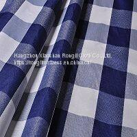 Plaid polyester polypropylene composite fabric