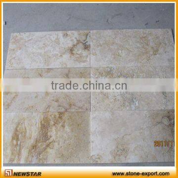 rusty tumbled travertine