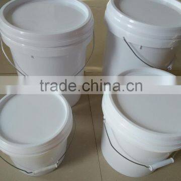 white plastic bucket with metal lid