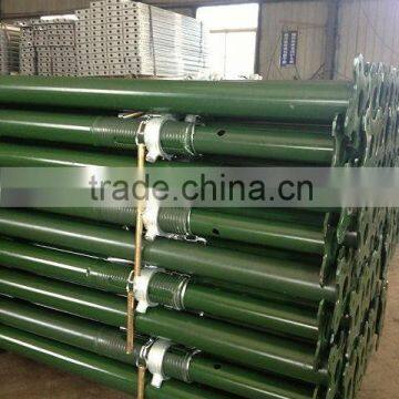 painted green steel shoring light props