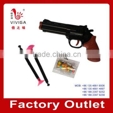 Plastic dart and gun toy with candy