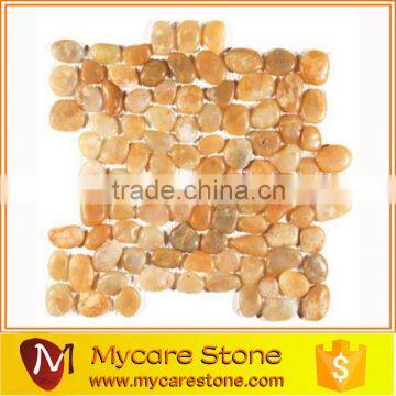 Decorative random sized pebble unpolished mosaic in honed white onyx