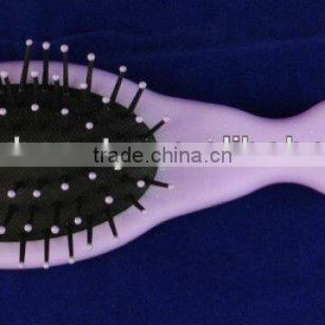 Small oval cushion brush