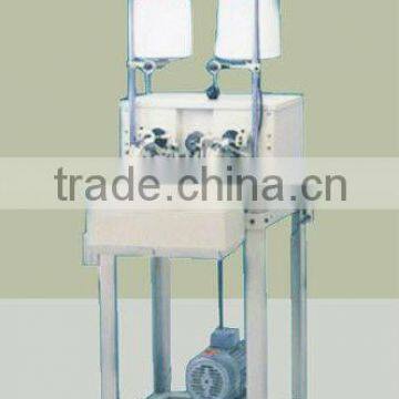 Automatic under-thread winding machine