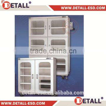 Electronic dry cabinet with heavy duty divider plate