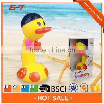 Kids play shooting water cartoon duck for baby bath