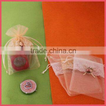 China cheap drawstring organza gift bags with logo ribbon