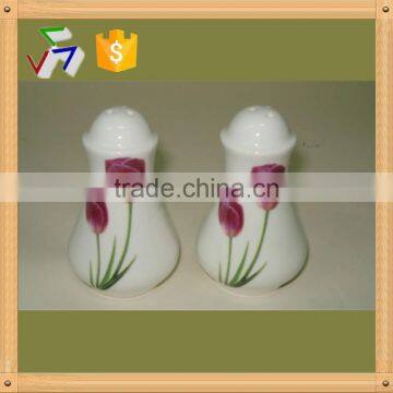 round ceramic salt & pepper shaker with metal stand