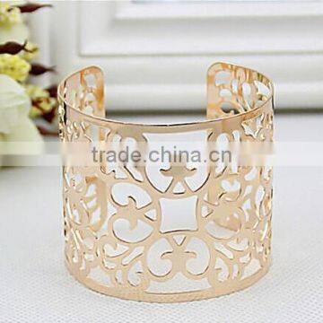 Trendy gold plated iron open end cuff hollow flower bangle bracelets for ladies