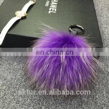 Big and fluffy raccoon fur bag charm