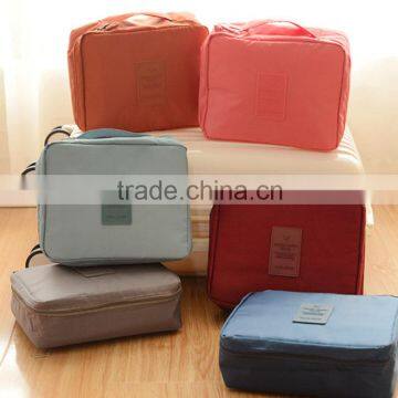 Wholesale price fashion travel cosmetic bag with handle