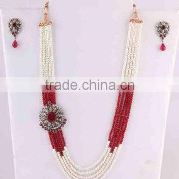 Indian manufacturers multi gemstone and pearl studded necklace set with drop earrings fashion jewelry. Brass metal.