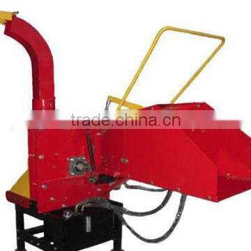 Wood chipper with chute exit