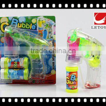 factory supply eco-freindly transparent flashing bubble gun with 2 bottles bubble water