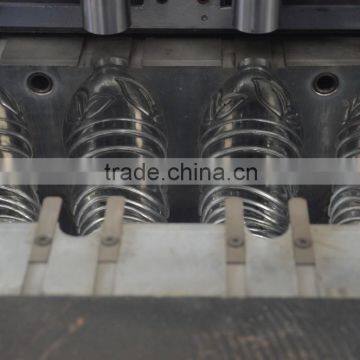 High Quality Semi Automatic 4 Cavities Drinking Water Bottle Blow Molding Machine photo-5