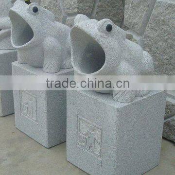 garden stone carving trash