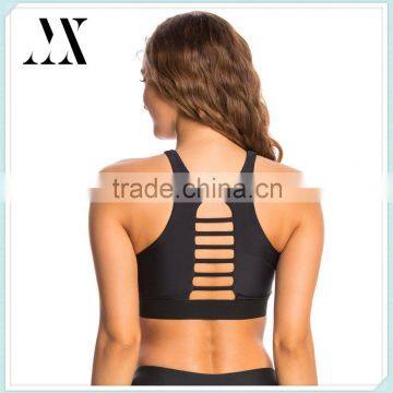 Medium support high round neckline racer back design with strappy cutout inset yoga sports bra