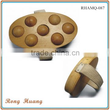 Hand held wooden roller massager