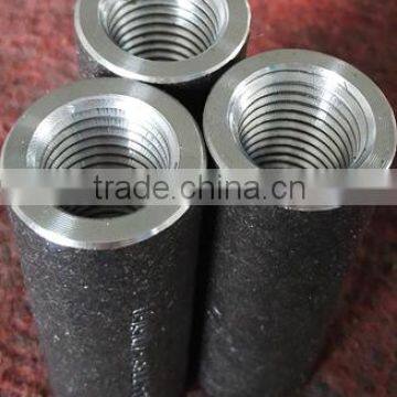 Construction material reinforcing steel bar coupler