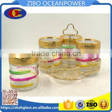 Set of 4 Glass Jar canister with Golden handle and revolving shelf