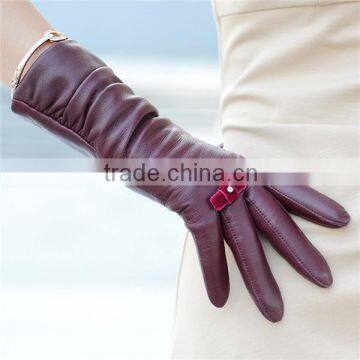 Stylish Women Wearing Leather Gloves with Samll Bow on Ring Finger