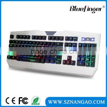 OEM white mac keyboard in colorful rainbow backlit