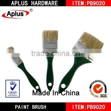 green paint brush wooden handle flat brush